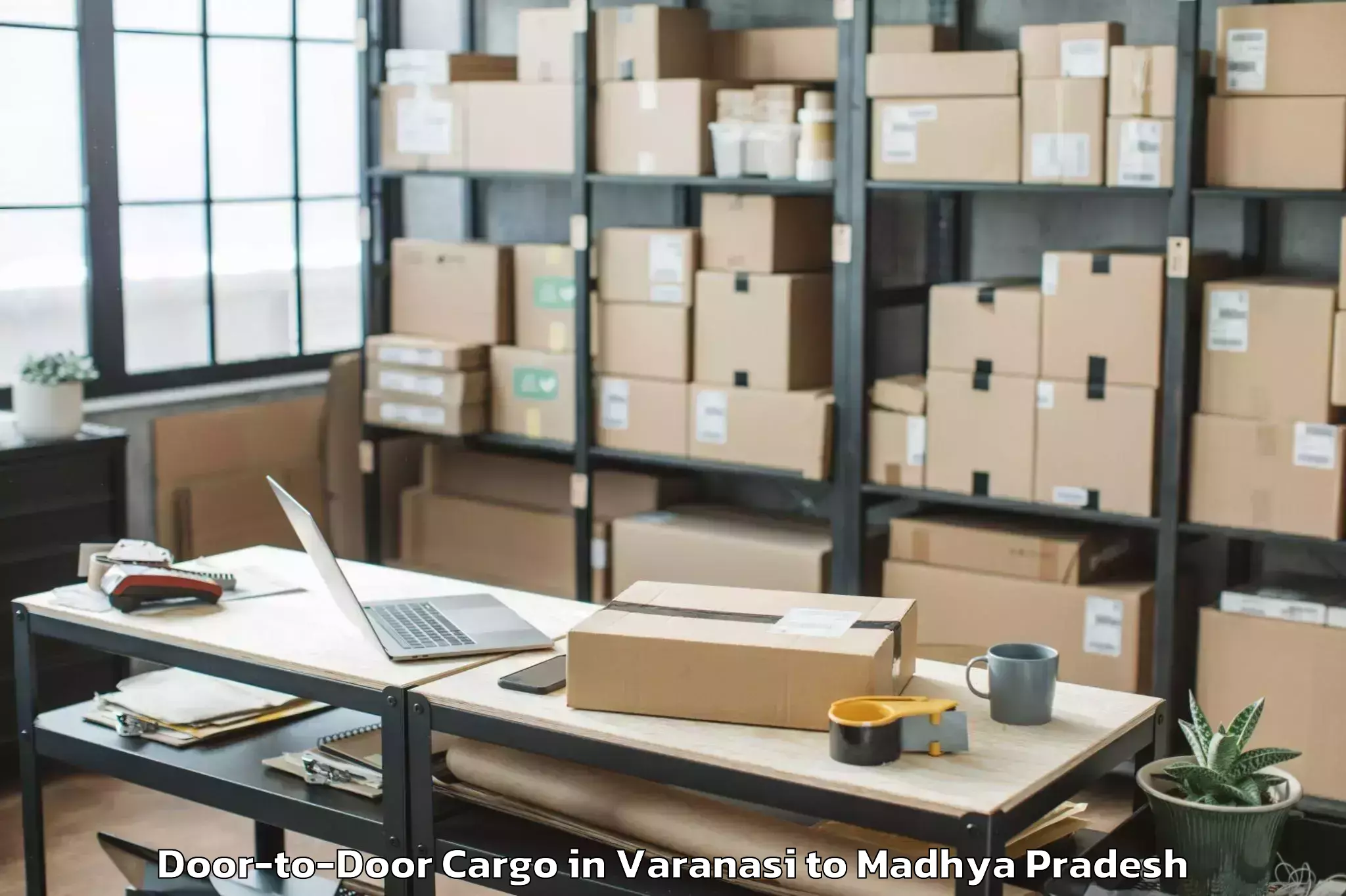 Varanasi to Khachrod Door To Door Cargo Booking